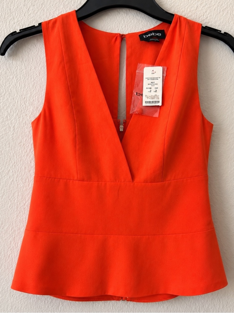 bebe NWT Orange Deep V-Neck Peplum Top Size 2